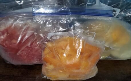 I like to preserve food by freezing because it is simple. Pictured above is food from my own freezer.  Frozen peppers, frozen chopped tomatoes, frozen eggs.