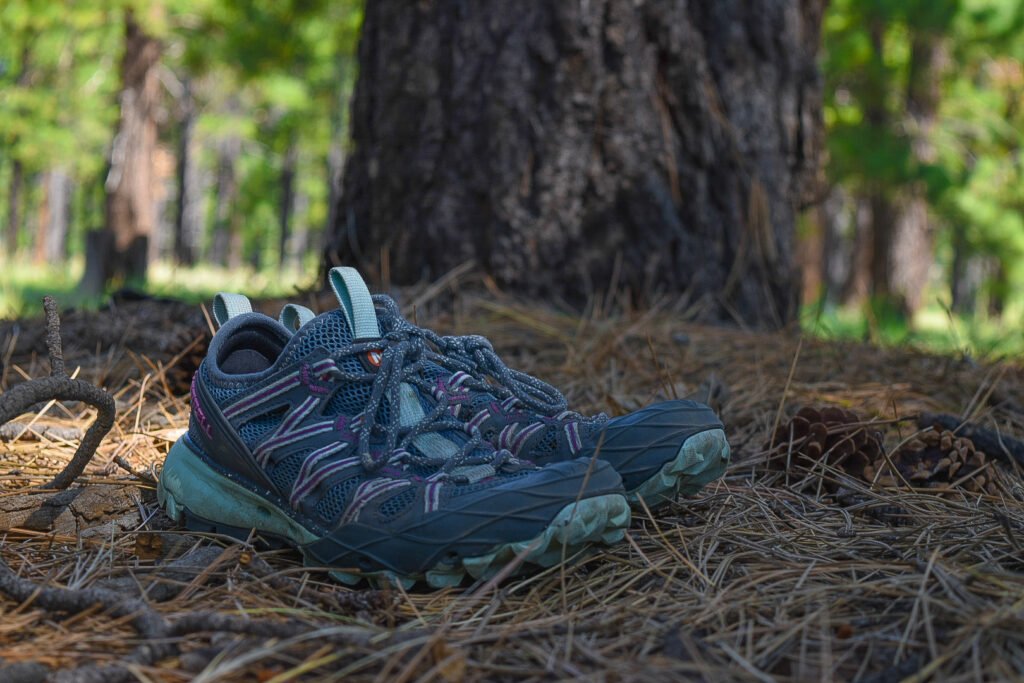 Bonus tip: I keep my shoes lightweight as well. This prevents fatigue AND keeps your bag light if you are switching to water shoes. Choprocks by Merrill are seen in this photo. 